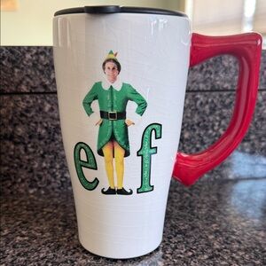 Elf Themed Hot Travel Mug. Excellent condition.  16 + ounces.